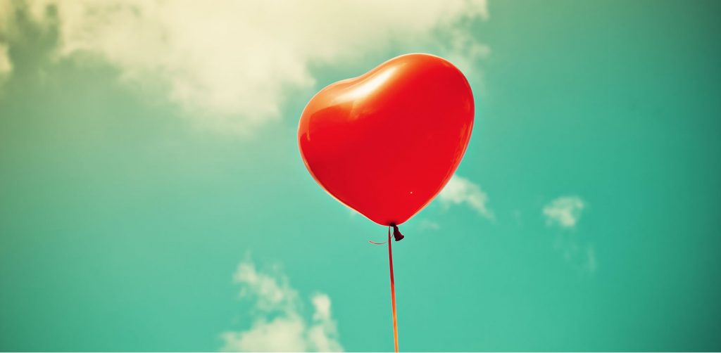 red heart-shaped balloon seeking love as a stepmom