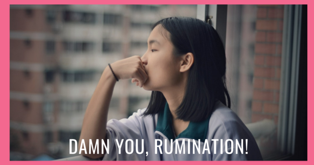 Asian Woman staring outside rumination