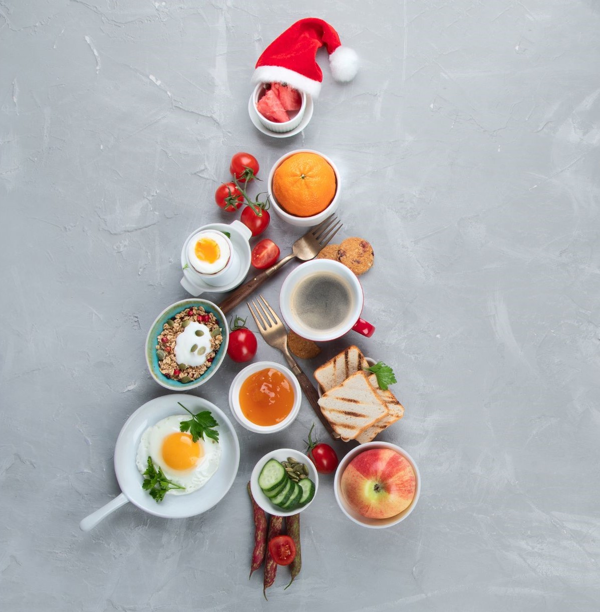 Cups of healthy foods arranged as a Christmas tree, to help maintain stepmom healthy habits