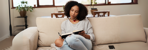 Black woman writing in her journal. Stepmom Resilient Blueprint program